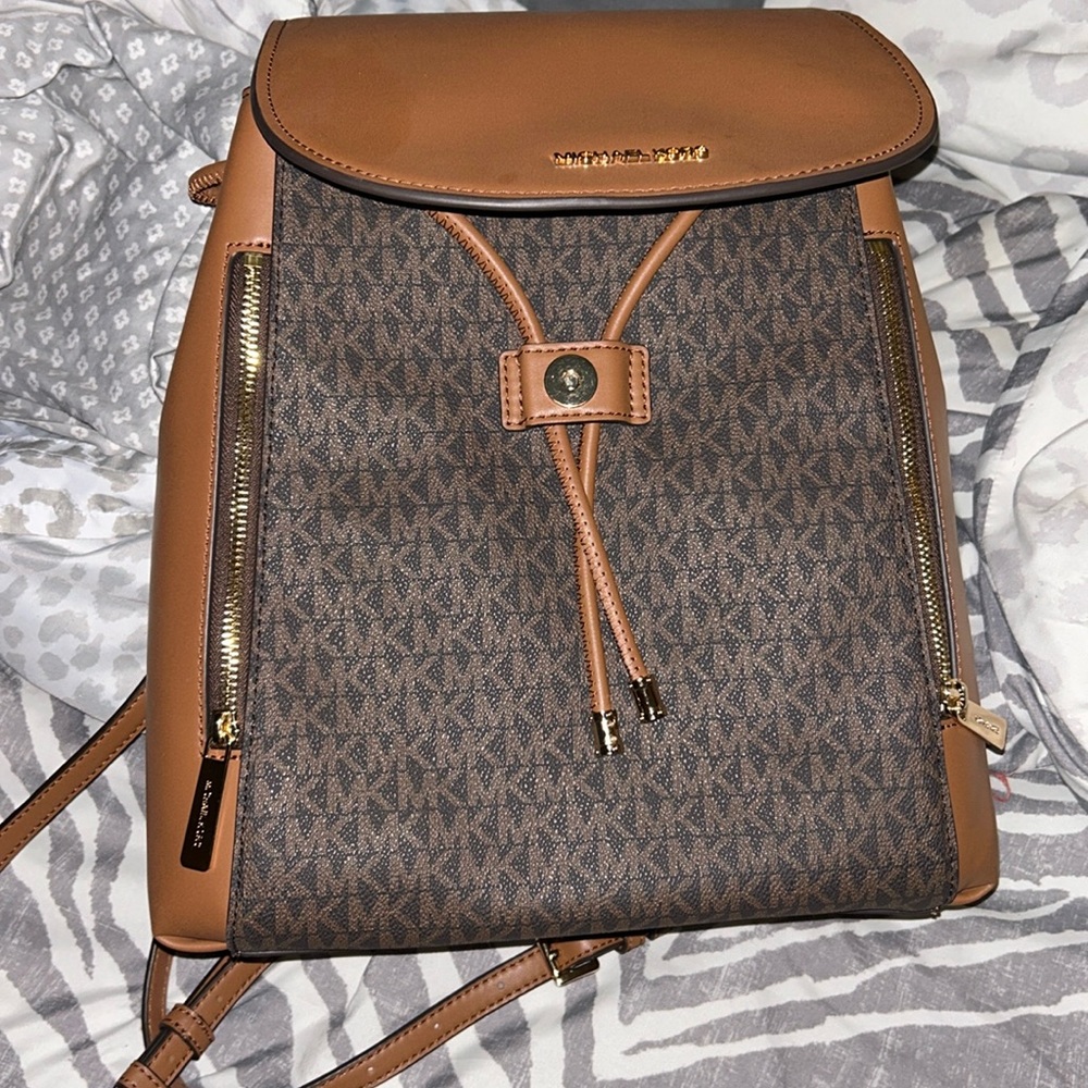 Micheal kors backpack. ( phoebe) I think is what it’s called. Not sure.